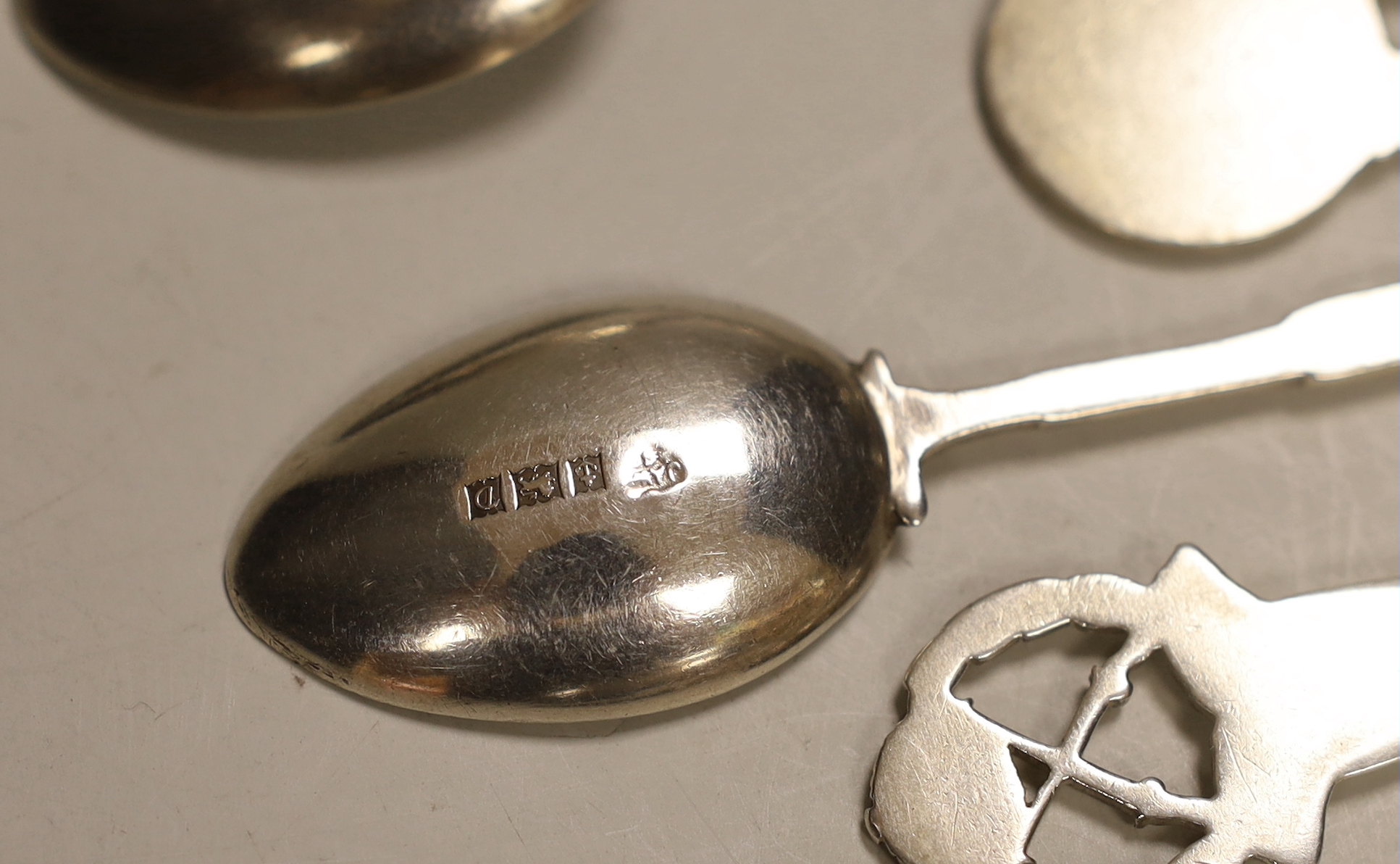 A Roald Amundsen commemorative .830 silver spoon, circa 1911, and five other commemorative spoons, of which four are silver including; Royal Military College, Small Arms School, Royal Army Service Corps, The Kensingtons